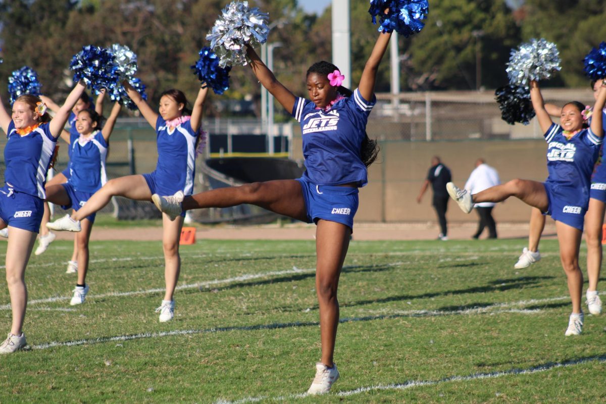 Senior Taylor Gray cheers during halftime of the Encinal vs Hercules game.