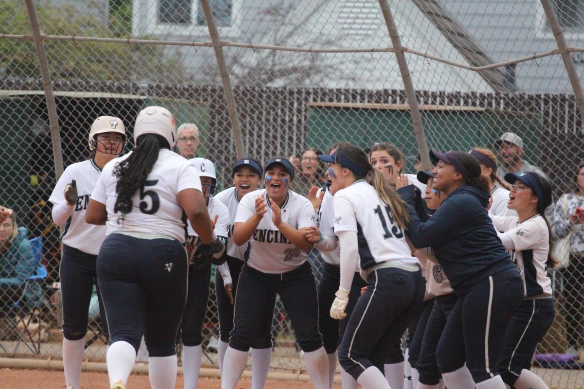 Teammates congratulate Riley Chadwick after her homerun against Miramonte. The Jets won 14-4.