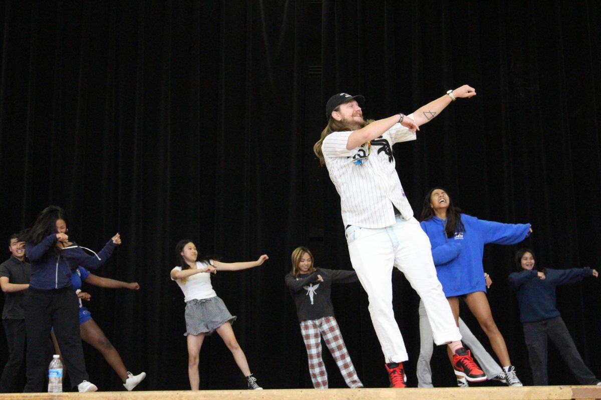 Quinn Randall practices with the Juniors for the 2023 dance performance.