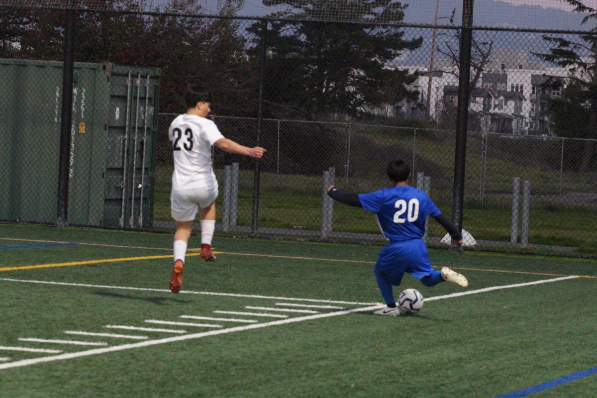 First-year striker Yeison Ahilon crosses the ball in an attempt to spark an opportunity to score a goal.