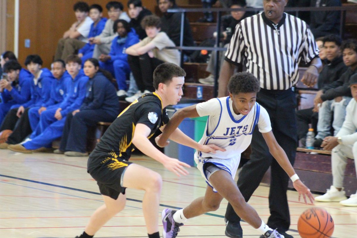 Encinal JV men's guard Kimani Mayfield (10) blows by defender on the fast break at Encinal High School on January 11th.
