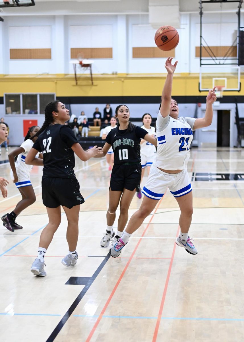 Senior Jazzy Alcantar breaks through defenders to shoot a contested layup in the NCS championship game on March 1, 2025.