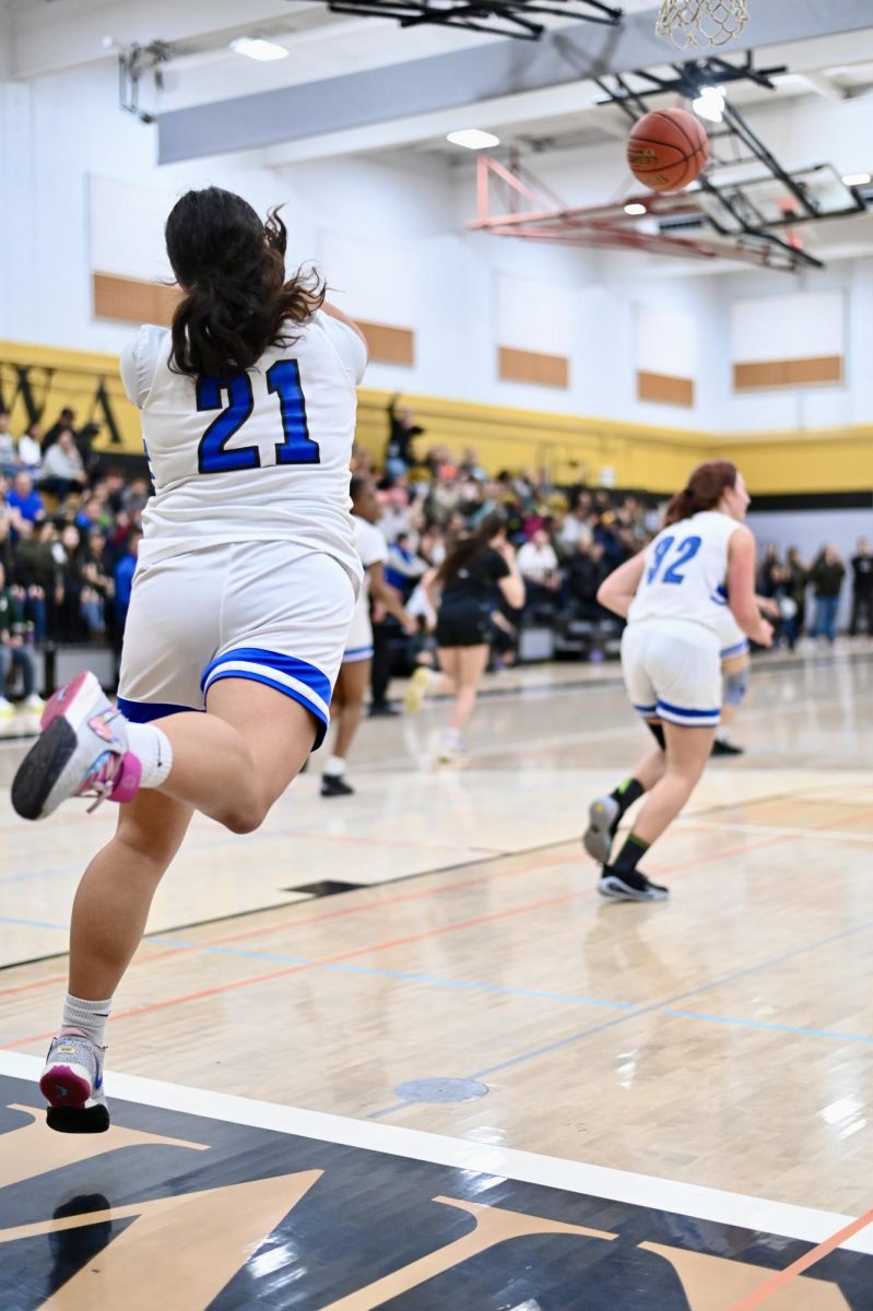 Senior Jazzy Alcantar looks to push the ball down the court during the second half of the NCS final.